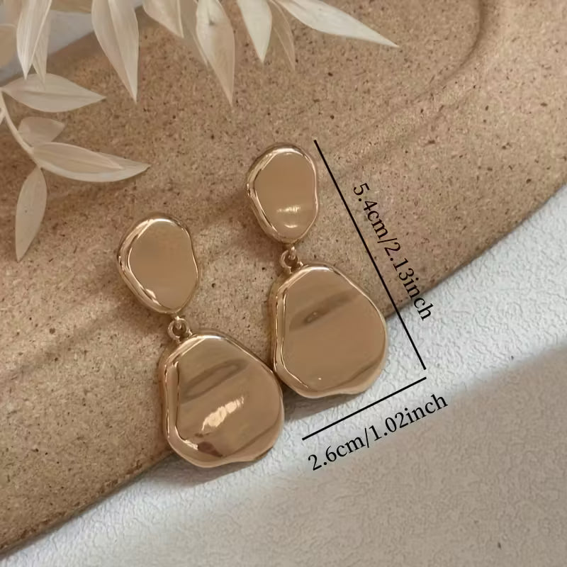 Pendientes colgantes geométricos con costuras irregulares