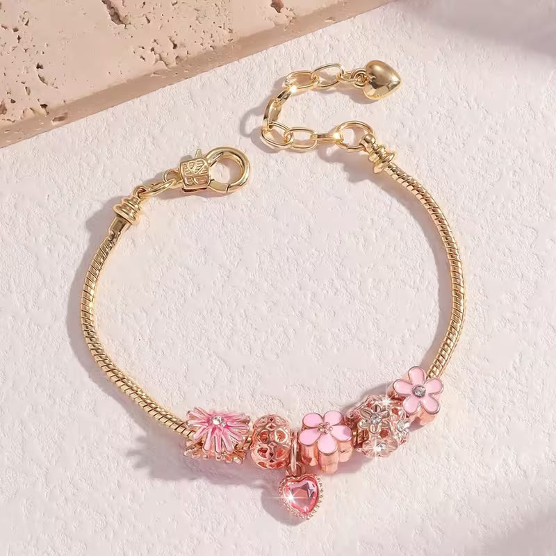 Pulsera dorada tipo Charm