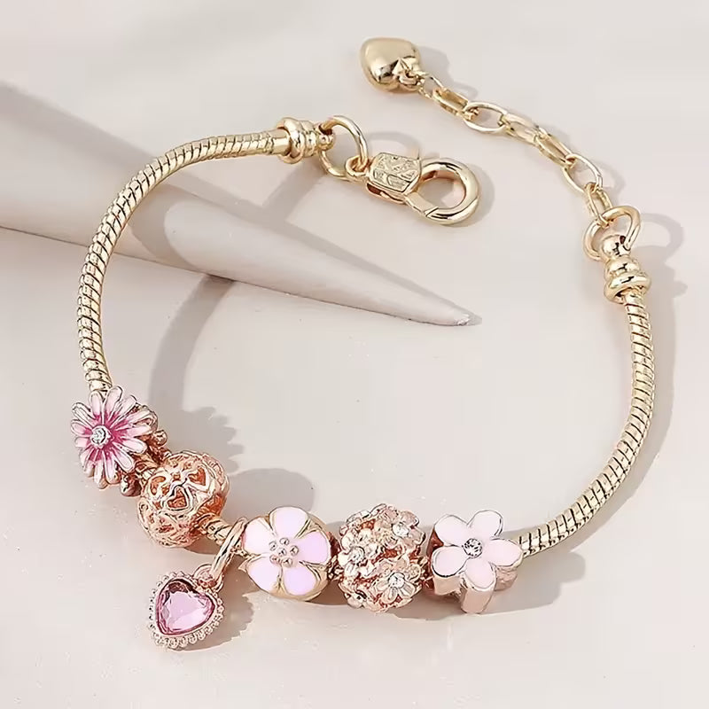 Pulsera dorada tipo Charm