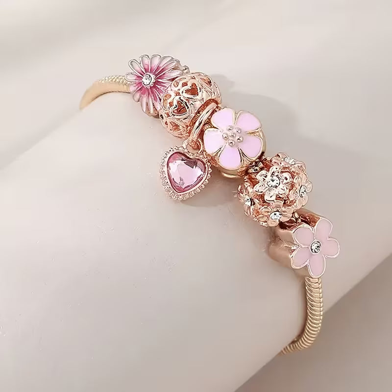 Pulsera dorada tipo Charm