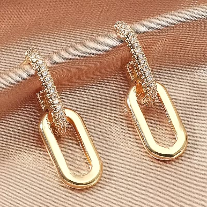 Aretes dorados tipo Cadena